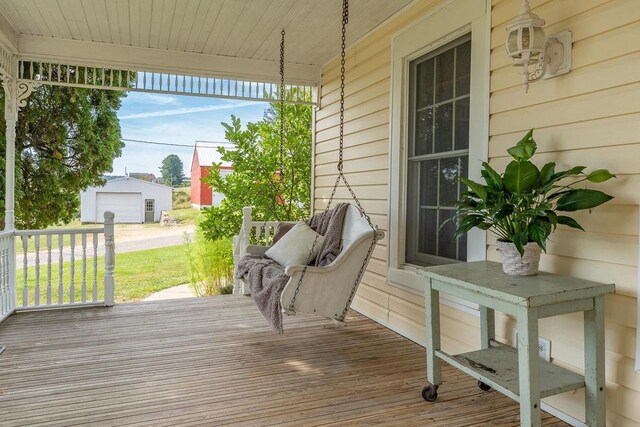 S617 County Road G, Wonewoc, WI 53968 - wooden deck with an outbuilding and covered porch