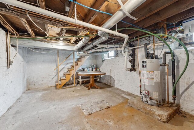 S617 County Road G, Wonewoc, WI 53968 - below grade area featuring gas water heater and stairway