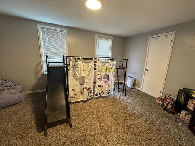 4153 N 60th St, Milwaukee, WI 53216 - misc room featuring baseboards, carpet, and plenty of natural light
