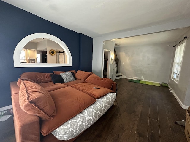 4153 N 60th St, Milwaukee, WI 53216 - living room with dark wood-style flooring, baseboards, and visible vents