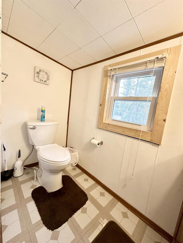 N7824 Typner Lake Rd, Deerbrook, WI 54424 - bathroom featuring toilet, tile patterned floors, and baseboards