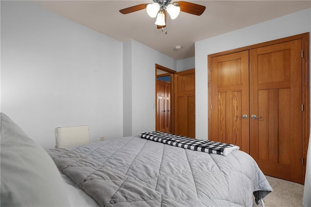 3943 Mill Run Rd, Eau Claire, WI 54703 - bedroom with carpet floors, a closet, and a ceiling fan