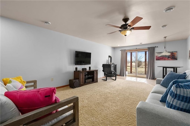 3943 Mill Run Rd, Eau Claire, WI 54703 - carpeted living area featuring ceiling fan and baseboards