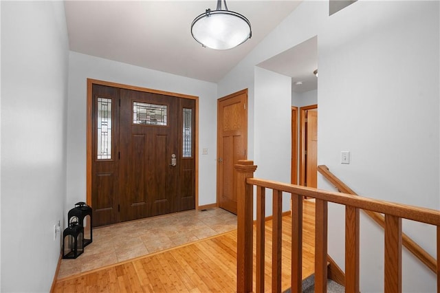 3943 Mill Run Rd, Eau Claire, WI 54703 - foyer featuring lofted ceiling and light wood-style flooring