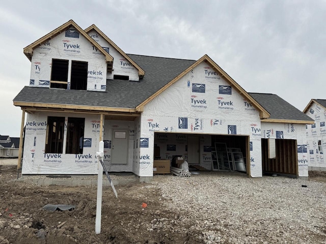 1690 Whalen Dr, Oconomowoc, WI 53066 - property in mid-construction with an attached garage and a shingled roof