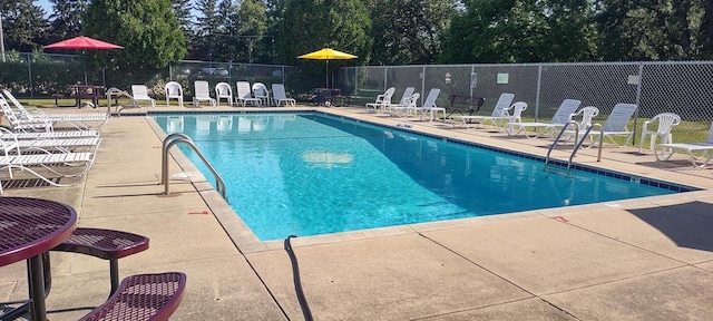 4141 W Cherrywood Ln, Brown Deer, WI 53209 - pool featuring a patio and fence