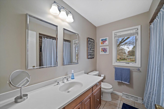 full bathroom featuring tile patterned floors, toilet, baseboards, visible vents, and vanity