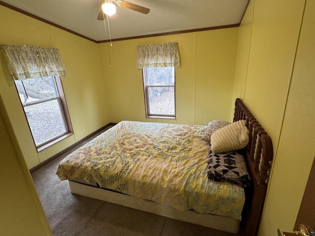 68485 N George St, Iron River, WI 54847 - carpeted bedroom featuring ornamental molding and ceiling fan