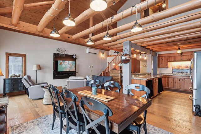 W9160 Ripley Rd, Cambridge, WI 53523 - dining room featuring wooden ceiling, light wood-type flooring, beam ceiling, stairway, and a wall unit AC