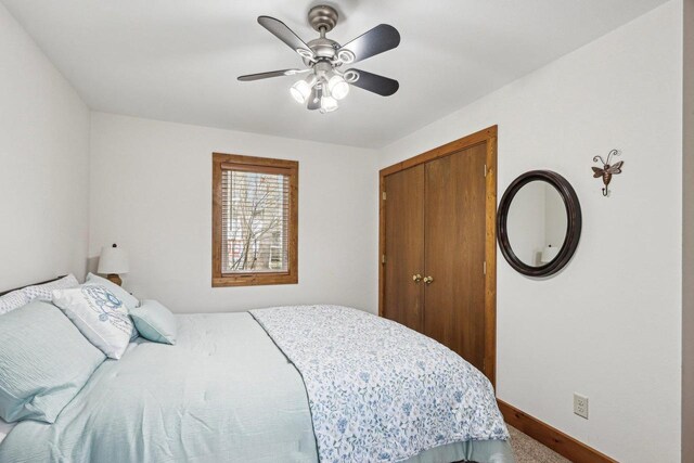 W9160 Ripley Rd, Cambridge, WI 53523 - bedroom featuring a closet, baseboards, and a ceiling fan