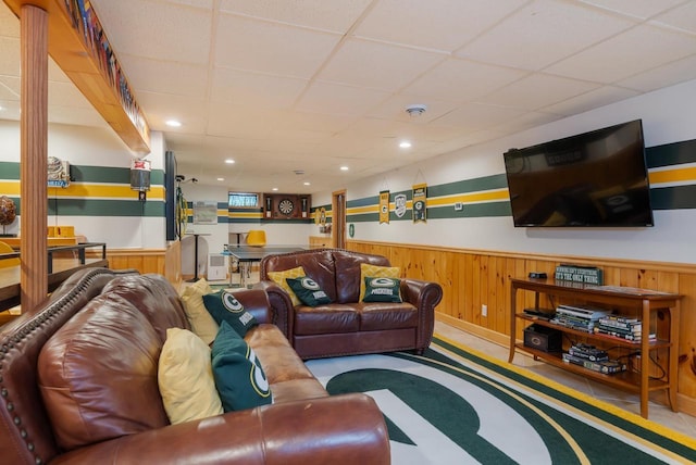 1501 Walls St, Green Bay, WI 54304 - living room featuring a paneled ceiling, wainscoting, and wood walls