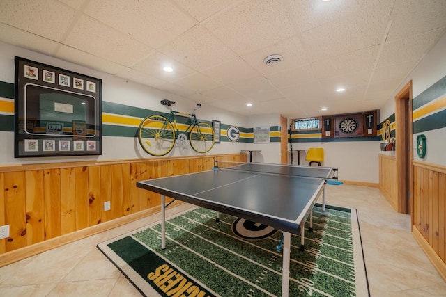 1501 Walls St, Green Bay, WI 54304 - recreation room featuring a paneled ceiling, a wainscoted wall, and wood walls