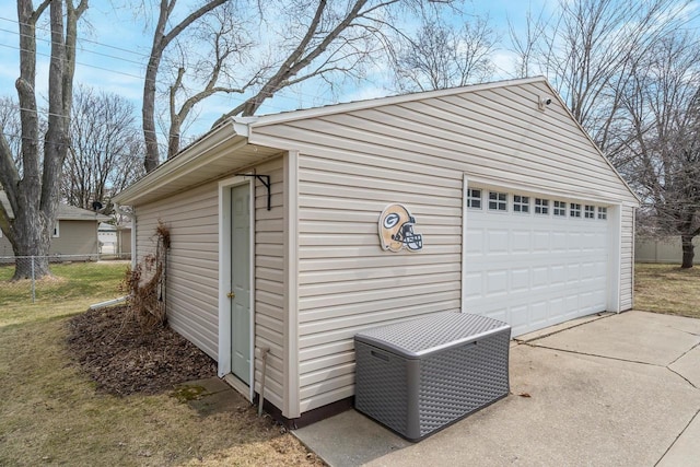 1501 Walls St, Green Bay, WI 54304 - detached garage featuring fence and central AC unit