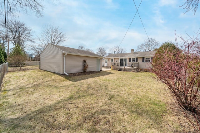 1501 Walls St, Green Bay, WI 54304 - back of property featuring a deck and an outdoor structure
