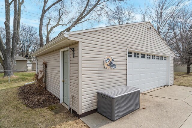 1501 Walls St, Green Bay, WI 54304 - detached garage featuring fence and central AC