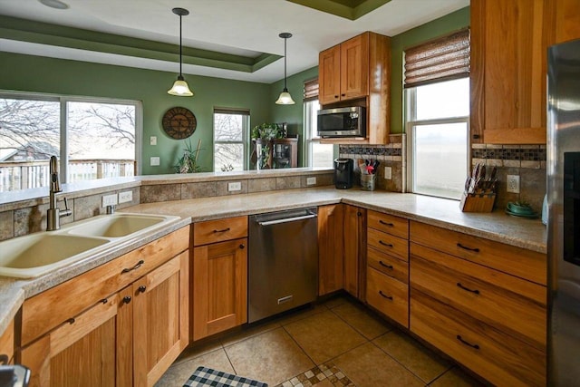 446 County Road Bb, Marshall, WI 53559 - kitchen featuring stainless steel appliances, a sink, and backsplash