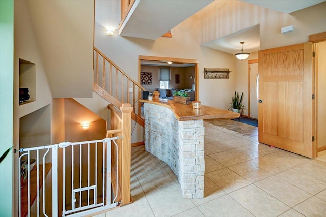 446 County Road Bb, Marshall, WI 53559 - interior space featuring stairway, a high ceiling, and light tile patterned flooring
