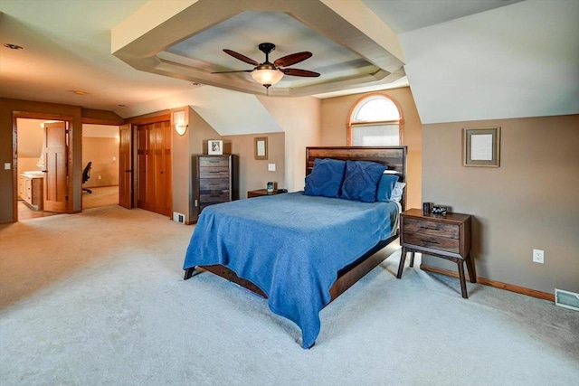 446 County Road Bb, Marshall, WI 53559 - bedroom with baseboards, light carpet, visible vents, a tray ceiling, and ceiling fan