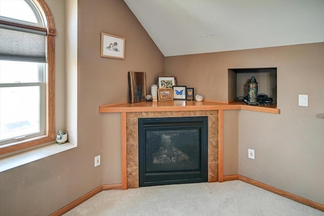 446 County Road Bb, Marshall, WI 53559 - room details featuring a tile fireplace, baseboards, and carpet