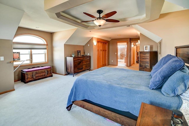 446 County Road Bb, Marshall, WI 53559 - carpeted bedroom with baseboards, a raised ceiling, ceiling fan, and ensuite bath