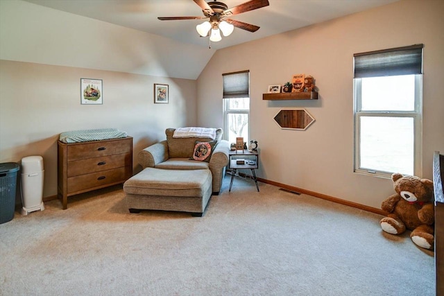 446 County Road Bb, Marshall, WI 53559 - living area with baseboards, a ceiling fan, visible vents, lofted ceiling, and carpet