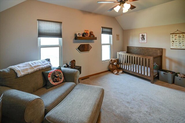 446 County Road Bb, Marshall, WI 53559 - carpeted bedroom featuring visible vents, baseboards, vaulted ceiling, and ceiling fan
