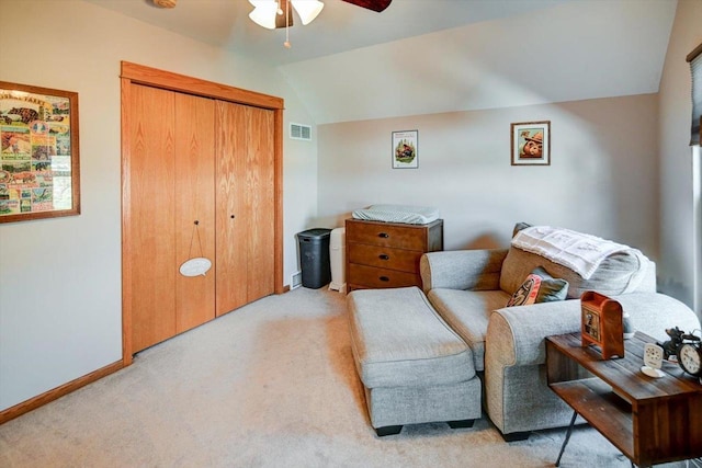 446 County Road Bb, Marshall, WI 53559 - living area featuring visible vents, baseboards, ceiling fan, vaulted ceiling, and light carpet