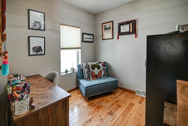 446 County Road Bb, Marshall, WI 53559 - office space featuring light wood-type flooring, baseboards, and visible vents