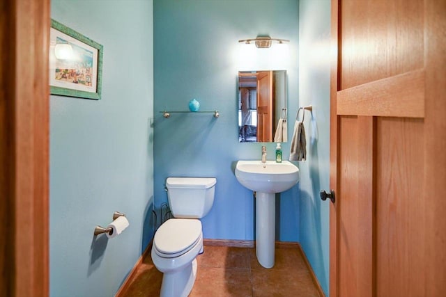 446 County Road Bb, Marshall, WI 53559 - half bathroom with tile patterned floors, toilet, and baseboards