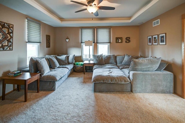 446 County Road Bb, Marshall, WI 53559 - living room with a tray ceiling, ceiling fan, and carpet flooring