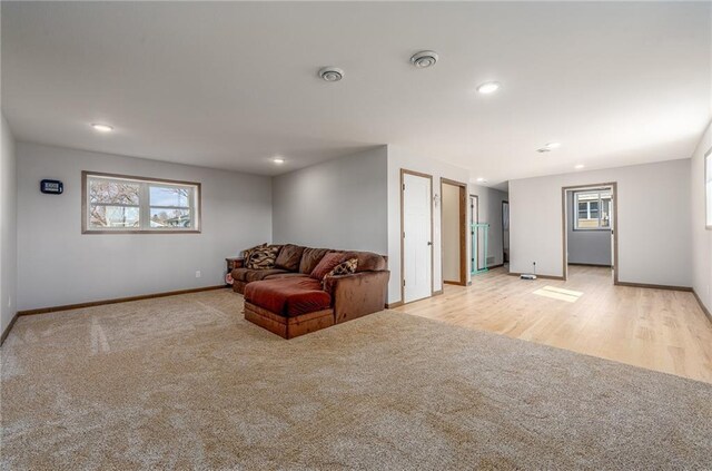 306 Dunn St, Colfax, WI 54730 - living area with visible vents, baseboards, carpet, and recessed lighting