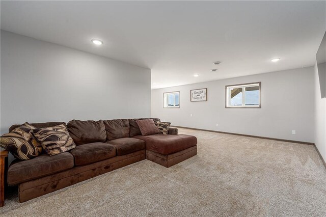 306 Dunn St, Colfax, WI 54730 - living area featuring baseboards, recessed lighting, and carpet flooring