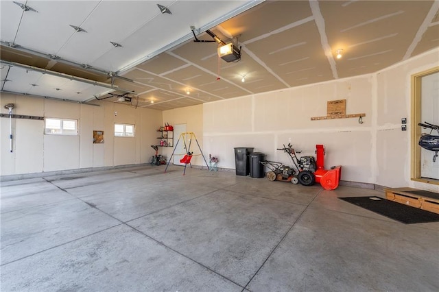 306 Dunn St, Colfax, WI 54730 - garage featuring a garage door opener