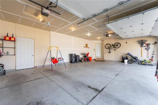 306 Dunn St, Colfax, WI 54730 - garage with a garage door opener