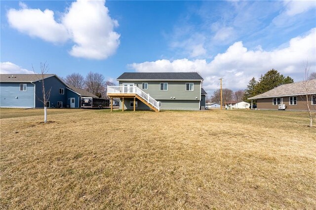 306 Dunn St, Colfax, WI 54730 - back of house with a yard and stairs