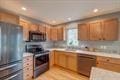 1359 Dianne Ave, Belleville, WI 53508 - kitchen featuring brown cabinets, light countertops, recessed lighting, and stainless steel electric range