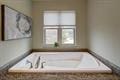 1359 Dianne Ave, Belleville, WI 53508 - bathroom with a garden tub