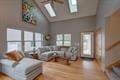 1359 Dianne Ave, Belleville, WI 53508 - living area with a skylight and high vaulted ceiling