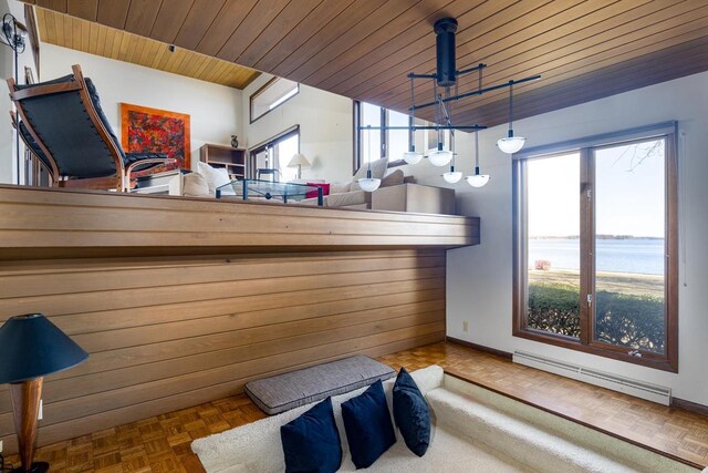 2136 White Swan Dr, Oshkosh, WI 54901 - interior space featuring a baseboard radiator, wooden ceiling, and baseboards