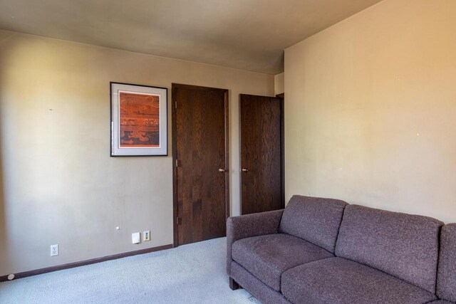 2136 White Swan Dr, Oshkosh, WI 54901 - carpeted living room with baseboards