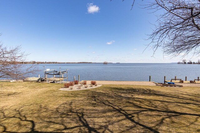 2136 White Swan Dr, Oshkosh, WI 54901 - exterior space with a boat dock and a water view