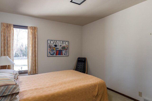 2136 White Swan Dr, Oshkosh, WI 54901 - bedroom featuring carpet floors, baseboards, and visible vents