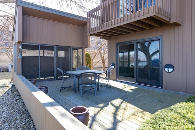 2136 White Swan Dr, Oshkosh, WI 54901 - wooden terrace with outdoor dining area