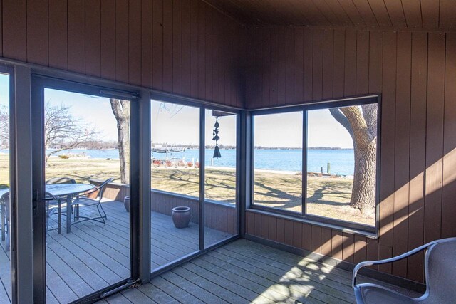 2136 White Swan Dr, Oshkosh, WI 54901 - unfurnished sunroom with a water view