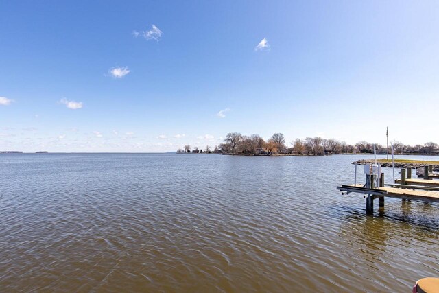 2136 White Swan Dr, Oshkosh, WI 54901 - dock area with a water view and boat lift