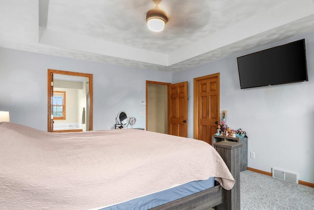911 Chalfont Dr, Sun Prairie, WI 53590 - bedroom featuring visible vents, carpet, a raised ceiling, and baseboards