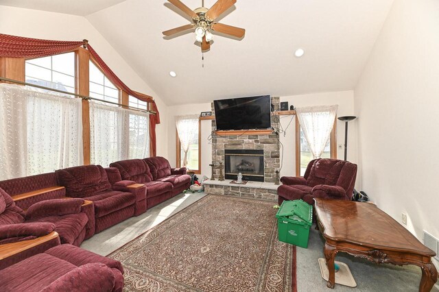 2421 Dover Ln, Mount Pleasant, WI 53406 - carpeted living room with a fireplace, vaulted ceiling, a wealth of natural light, and ceiling fan