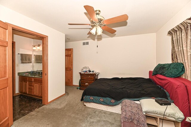 2421 Dover Ln, Mount Pleasant, WI 53406 - bedroom featuring ceiling fan, baseboards, ensuite bathroom, and visible vents