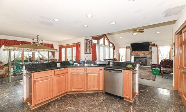 2421 Dover Ln, Mount Pleasant, WI 53406 - kitchen with dishwasher, a stone fireplace, a sink, and recessed lighting