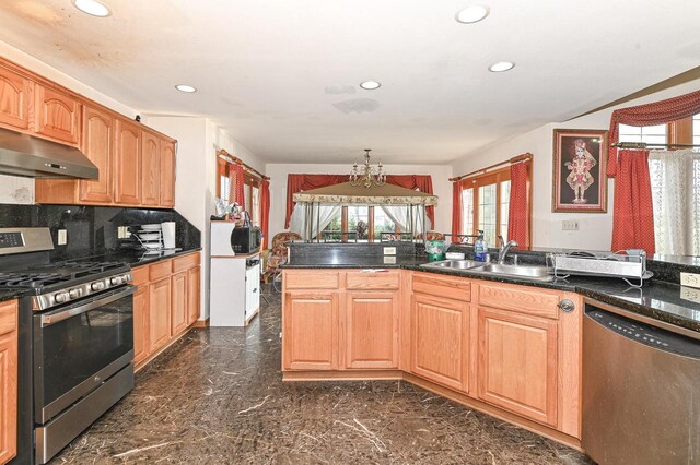 2421 Dover Ln, Mount Pleasant, WI 53406 - kitchen with a sink, recessed lighting, appliances with stainless steel finishes, and exhaust hood